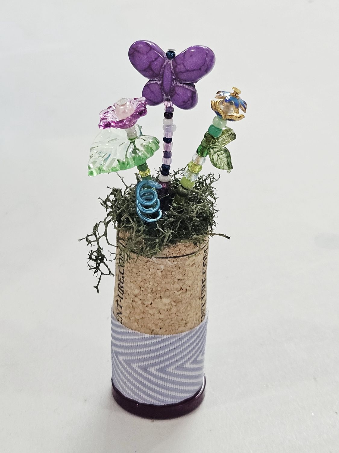 Purple and Blue Beaded flowers in cork