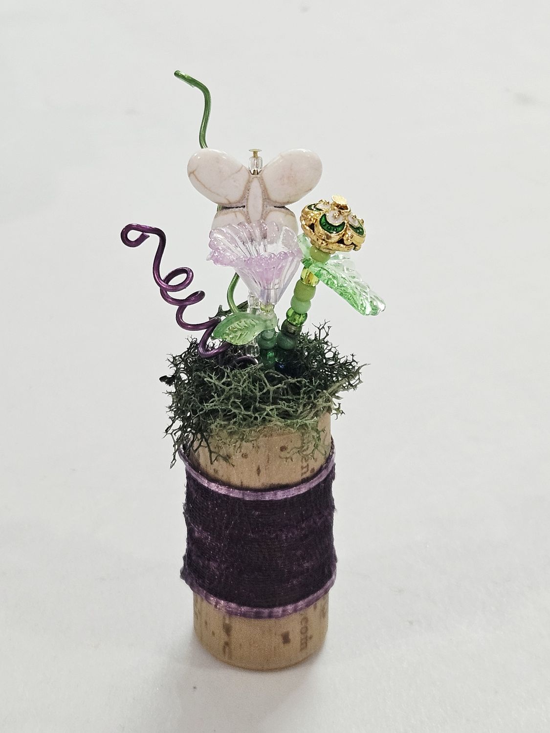 Purple and Green Beaded flowers in cork
