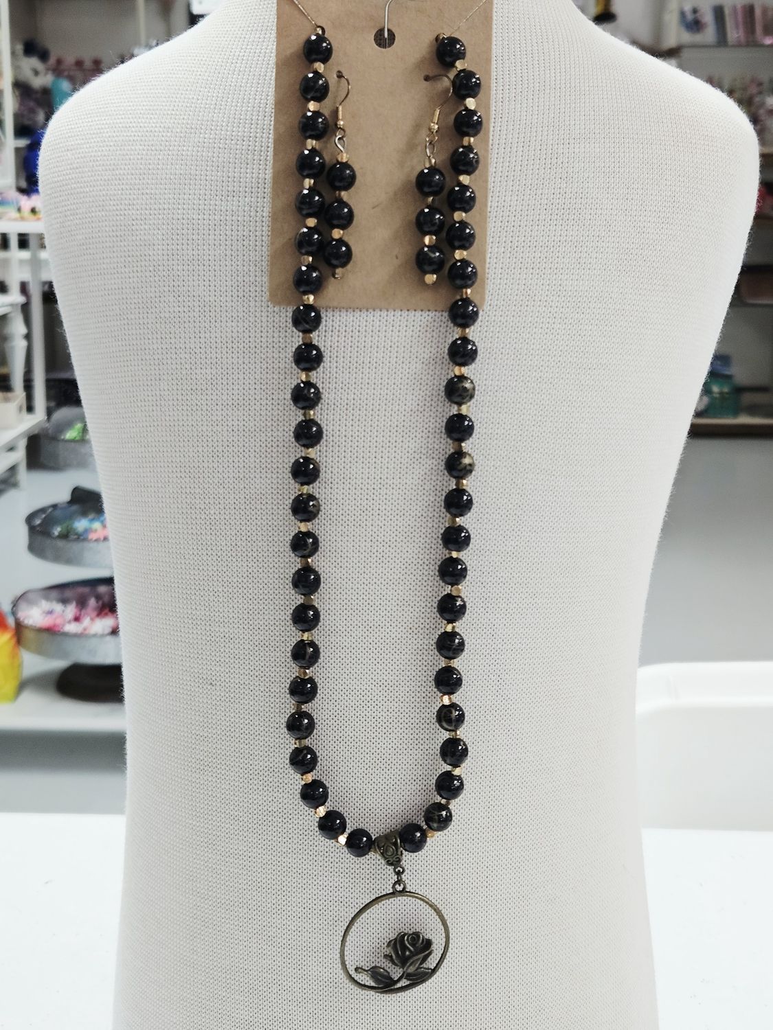 Black and Gold Beaded Necklace with Rose Pendant