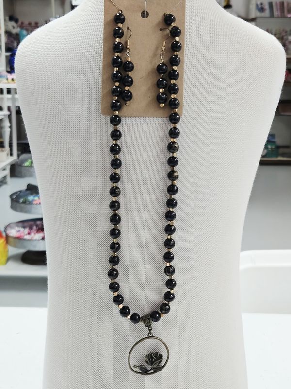 Black and Gold Beaded Necklace with Rose Pendant