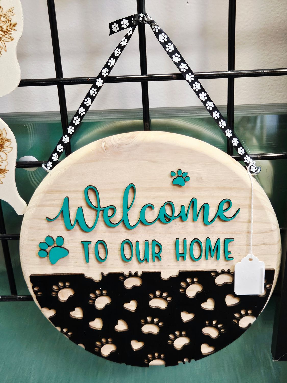Welcome to Our Home Round Teal w/Dog paws cut out