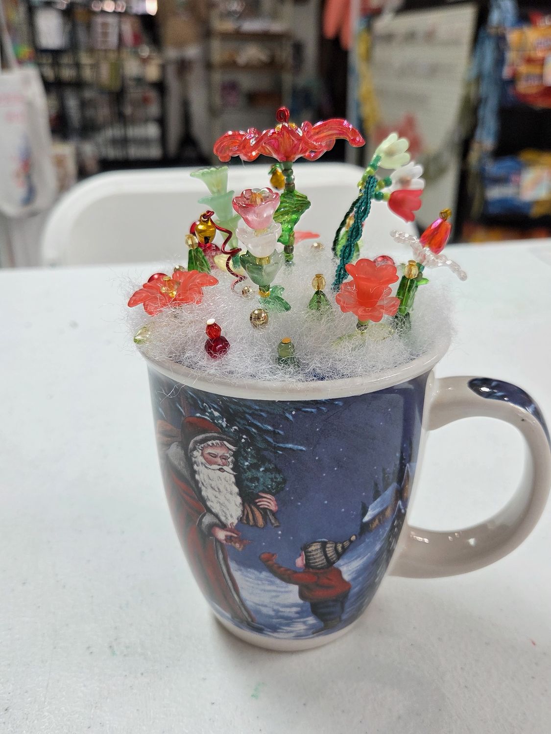 Beaded Flowers in Blue Christmas Mug with Santa and Child