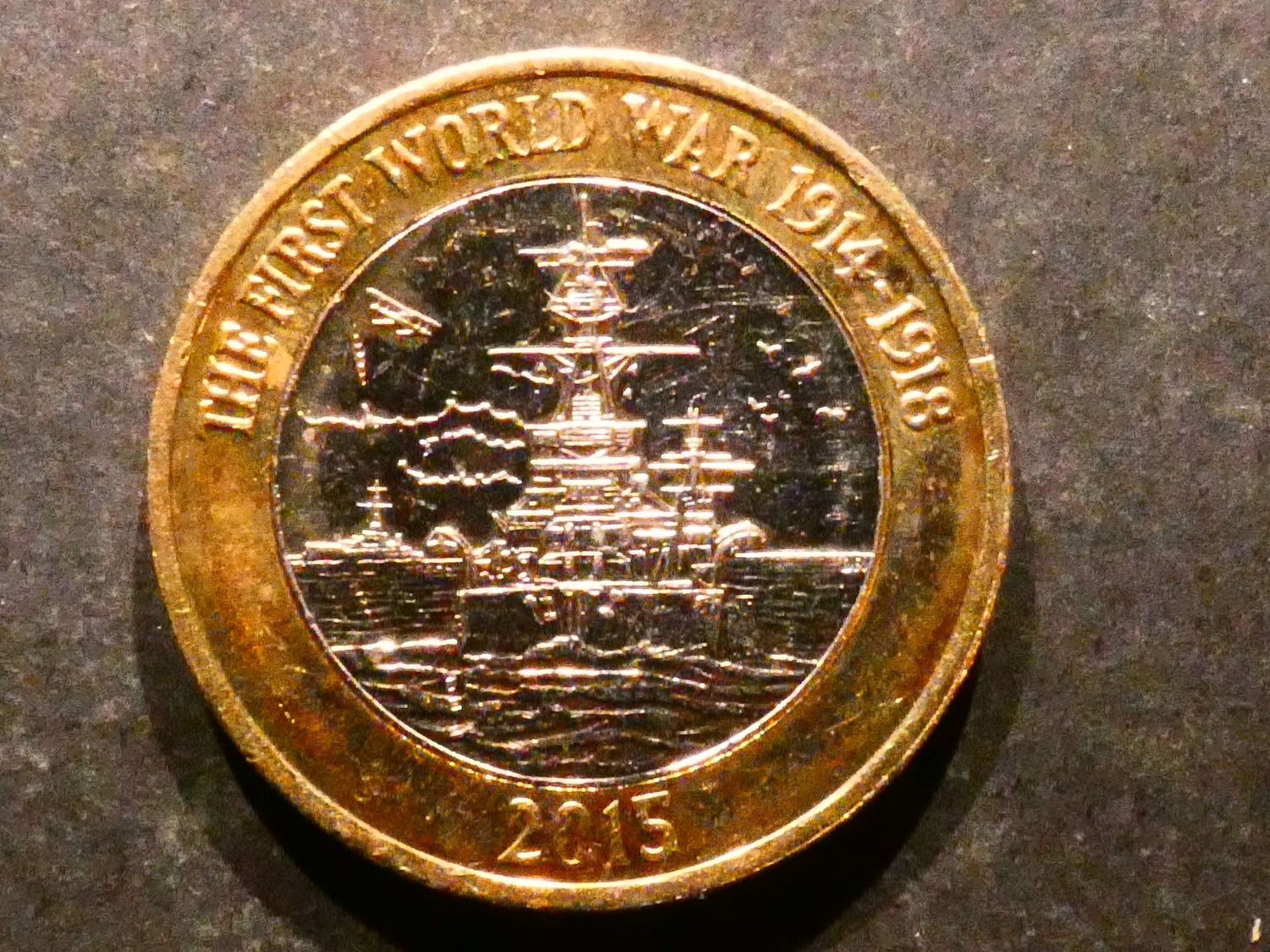 £2, 2015, WWII - Royal Navy, £2, 2015, WWII - Royal Navy, "sleeping cat" die flaw.