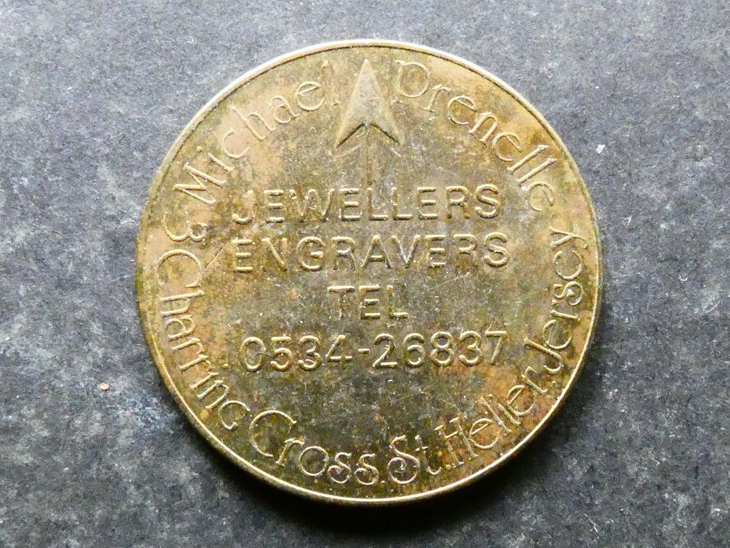 Jersey, value-stated check and drinks Jersey, value-stated check and drinks "spinner" token.