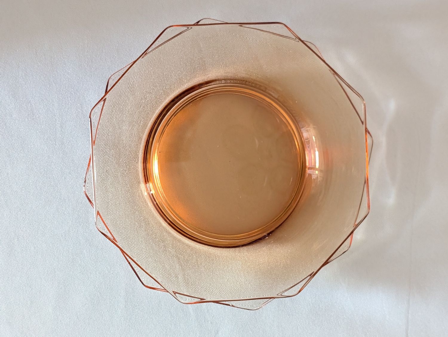 Two L.E. Smith octagonal amber/pink Depression glass plates.