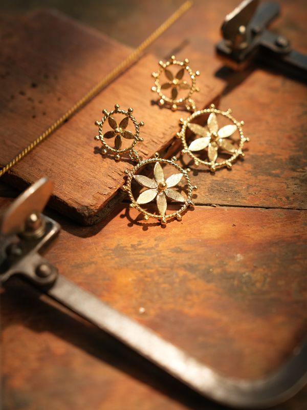 product photo christine bekaert jewelry handcrafted gold-plated mulmul duo earrings with star design
