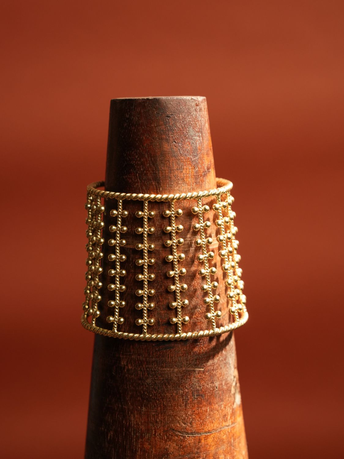 product photo christine bekaert jewelry handcrafted gold-plated nerigal statement cuff bracelet with adjustable size