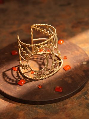 product photo christine bekaert jewelry handcrafted gold-plated nanna statement cuff bracelet with star design
