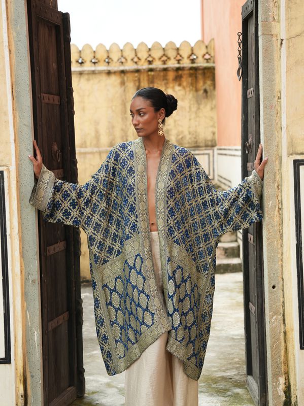 Model wearing statement kimono in handwoven handembroidered brocade saree designed by Christine Bekaert, unique piece in silk