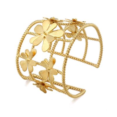 Product shot of flower cuff by Belgian Christine Bekaert handcrafted statement jewelry