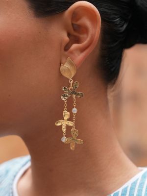 Product shot of large flower earrings with white moonstone by Belgian Christine Bekaert handcrafted statement jewelry model