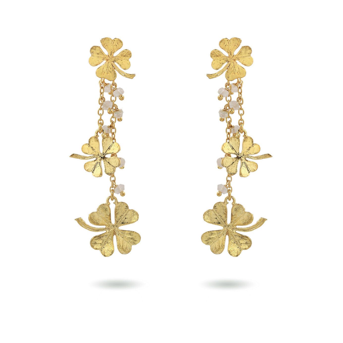 Product shot of small clover earrings with white moonstone by Belgian Christine Bekaert handcrafted statement jewelry 
