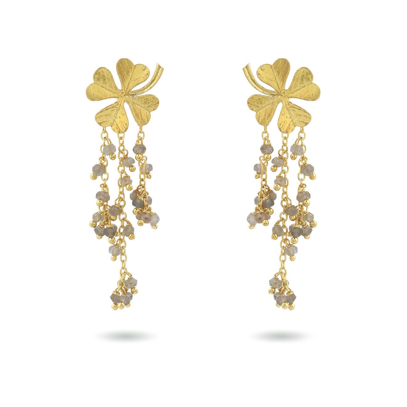 Product shot of small clover earrings with white moonstone by Belgian Christine Bekaert handcrafted statement jewelry 