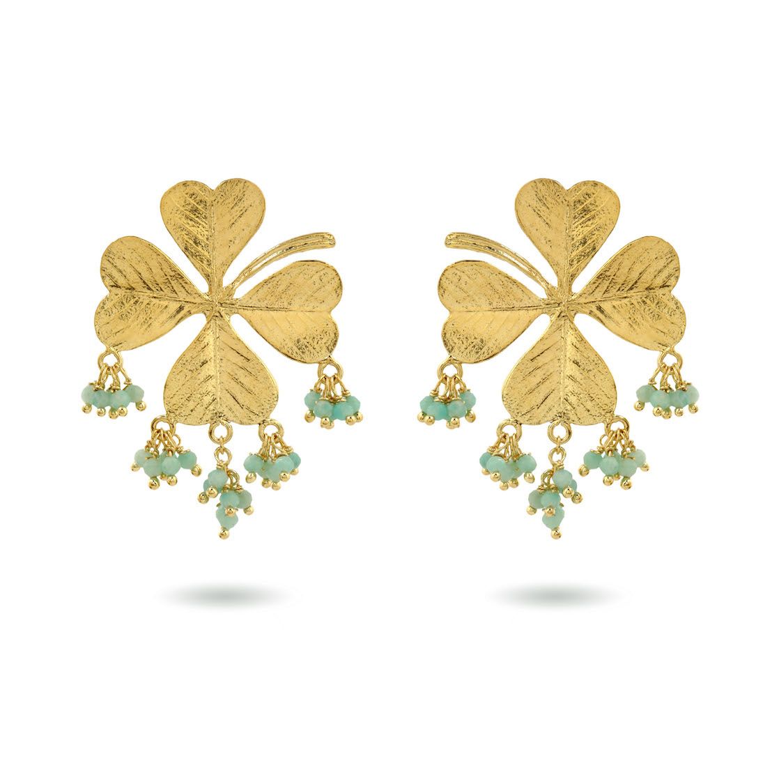 Product shot of large clover earrings with white moonstone by Belgian Christine Bekaert handcrafted statement jewelry 