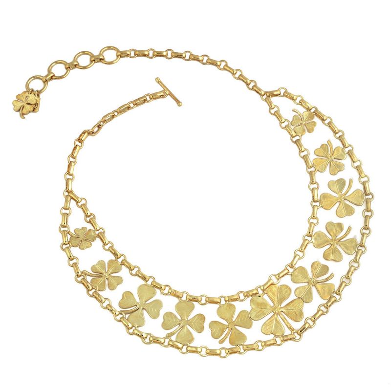 Product shot of short clover necklace by Belgian Christine Bekaert handcrafted statement jewelry 