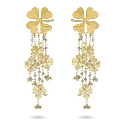 Product shot of large clover earrings with white moonstone by Belgian Christine Bekaert handcrafted statement jewelry 