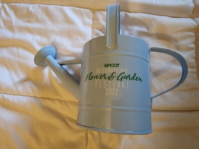 Orange Bird Flower and Garden Festival 2022 watering tin