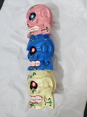 Triple Skull wooden figure