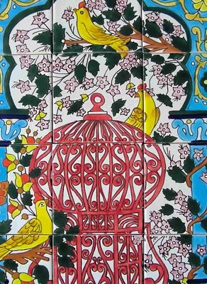 Tableau mural méditerranéen composé de 12 carreaux de céramique peints à la main avec ornements floraux.