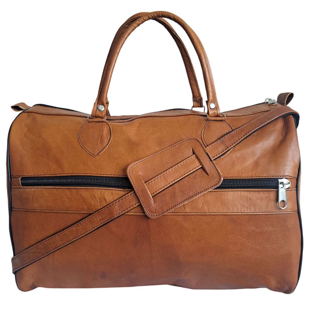 Klassische Reisetasche "Horizontal Classic" aus hellbraunem Ziegenleder in Handarbeit.
