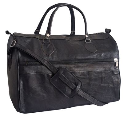 Handgefertigte Reisetasche aus schwarzem Ziegenleder im markanten verwaschenen Look.
