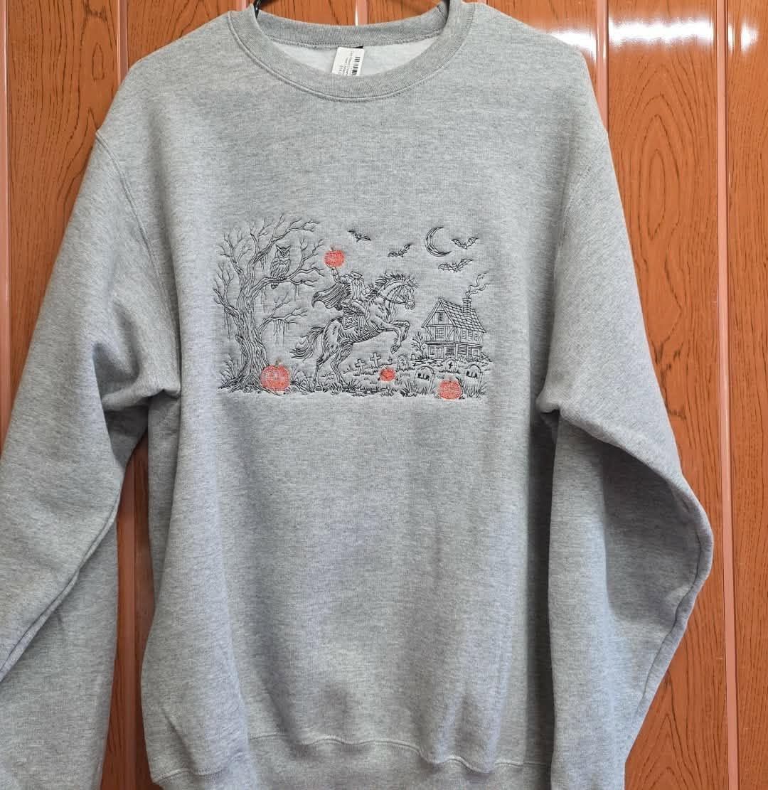 Core Fleece Crewneck Sweatshirt with a Headless Horseman Embroidered on it