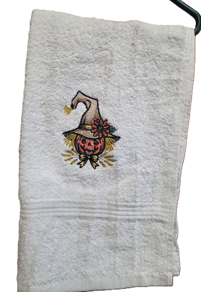 Hand Towel with a Scarecrow Embroidered on it