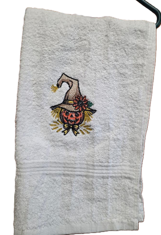 Hand Towel with a Scarecrow Embroidered on it