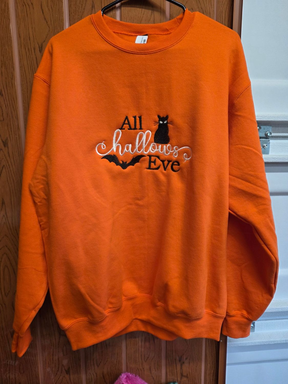 Core Fleece Crewneck Sweatshirt size Large with a Cat and Bat Embroidered on it