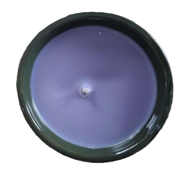 Candle- Pumpkin design on a small vessel