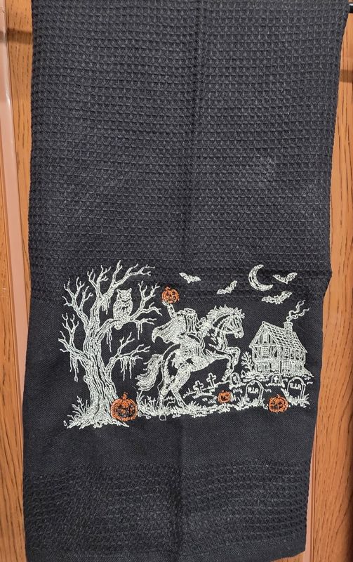 Honeycomb Towel with Flat Band with Headless Horseman Embroidered on it.