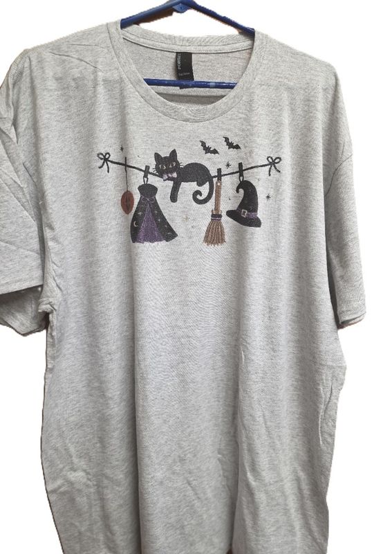 Gildan Large Tee with a Clothesline with socks on it