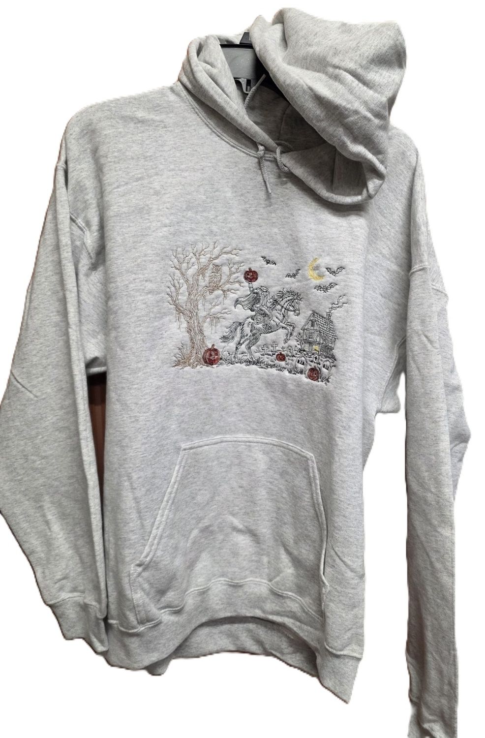 Gildan Hooded Sweatshirt with the Headless Horseman Embroidered on it