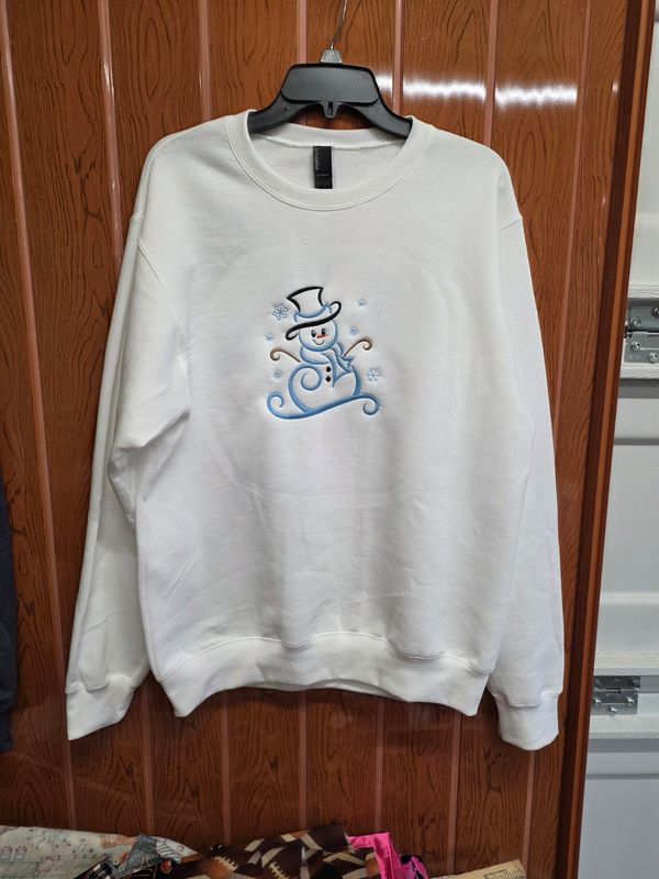Core Fleece Crewneck Sweatshirt with a Snowman Embroidered on it