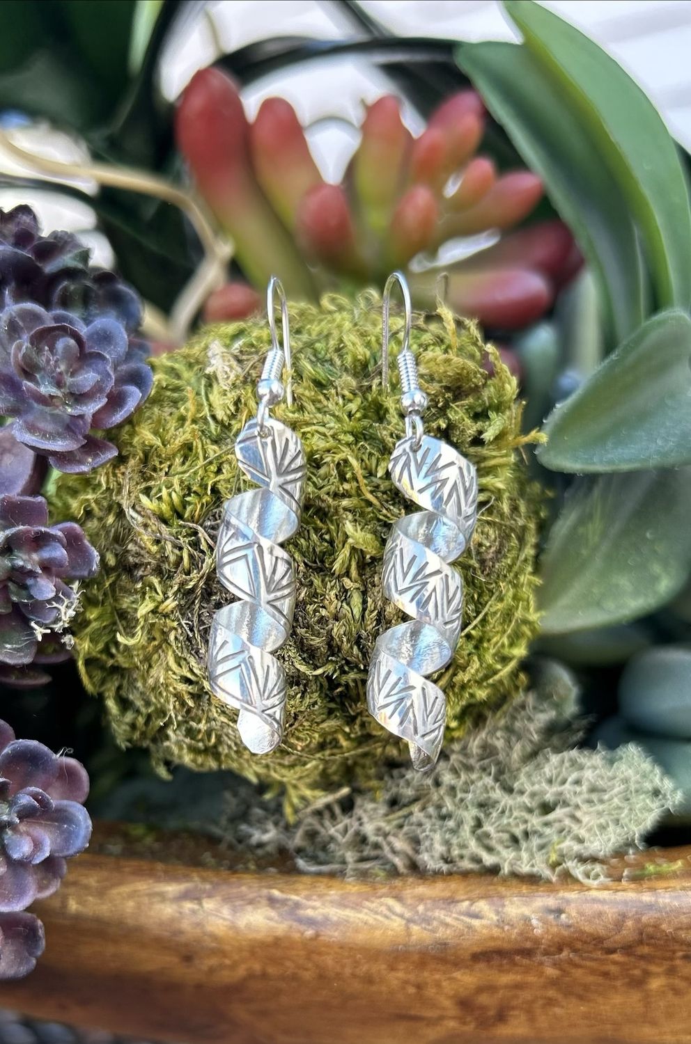 Native, Florence Tahe earrings with stamp work. 2” $90.00