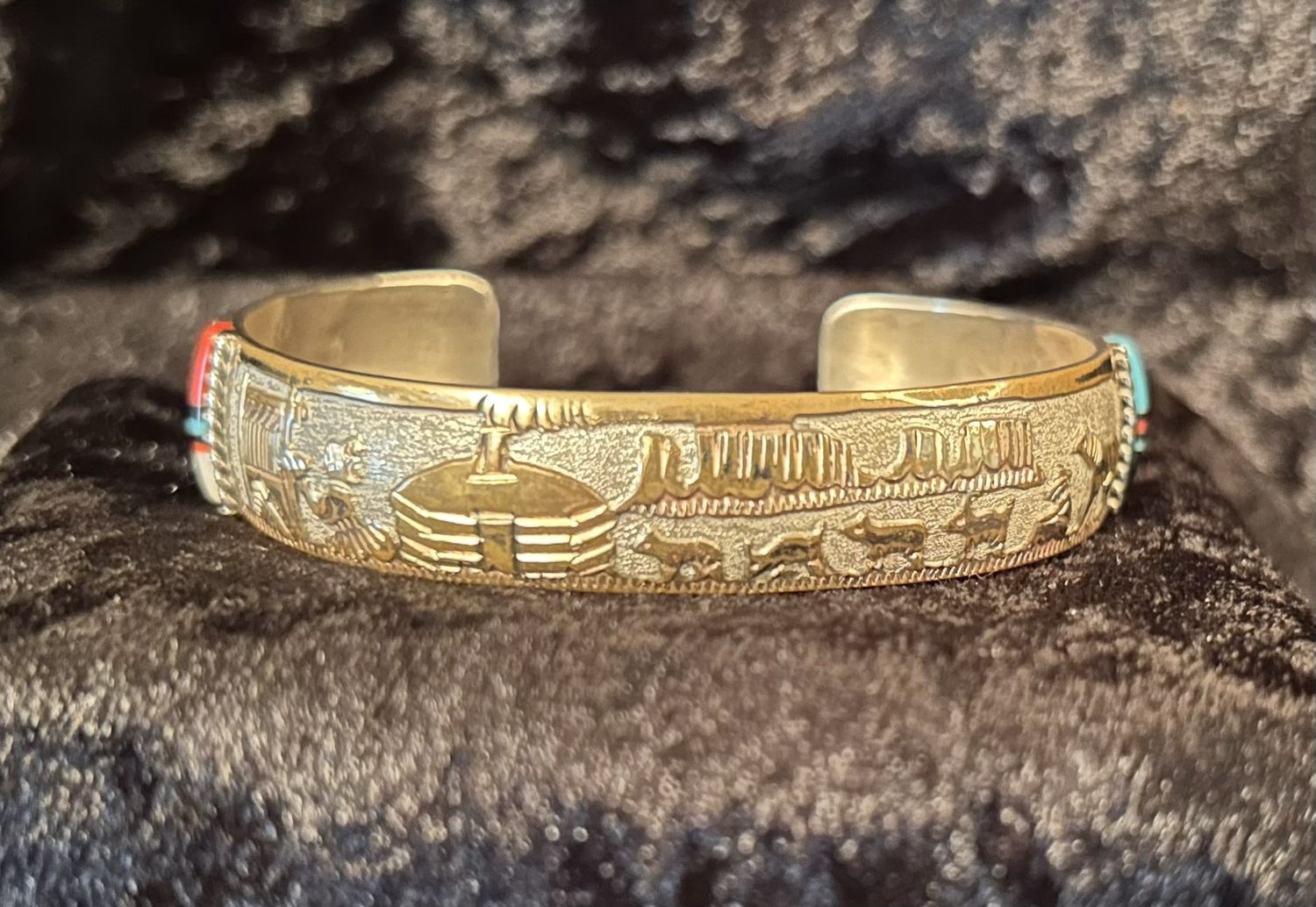 Native Storyteller Cuff, signed, Sterling and 10k G. F., w/turq, jet, mop, coral.