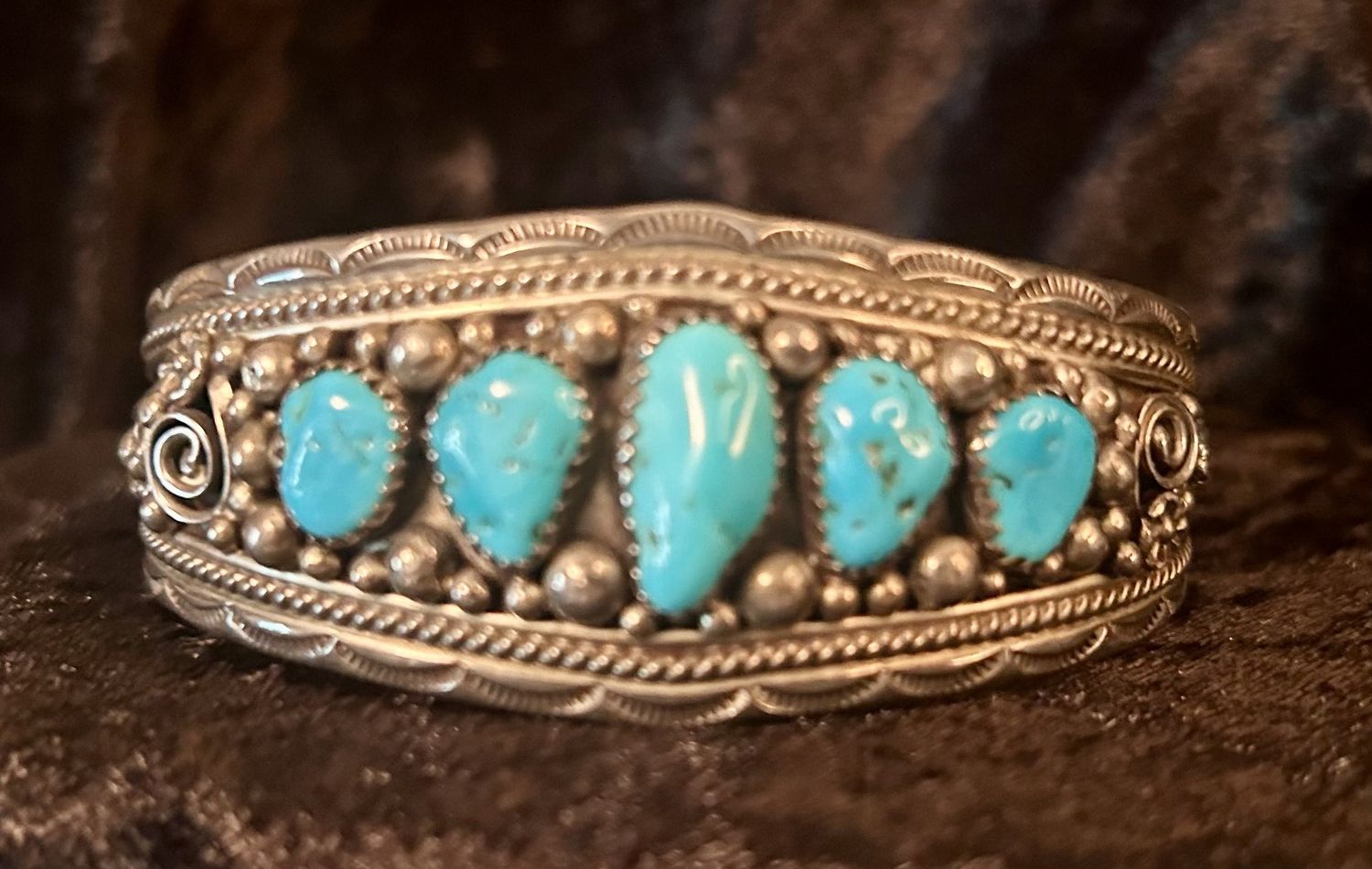 Native, stamped, Turquoise cuff.  6 1/2” x 1”, 39 grams.  Signed M Sterling.