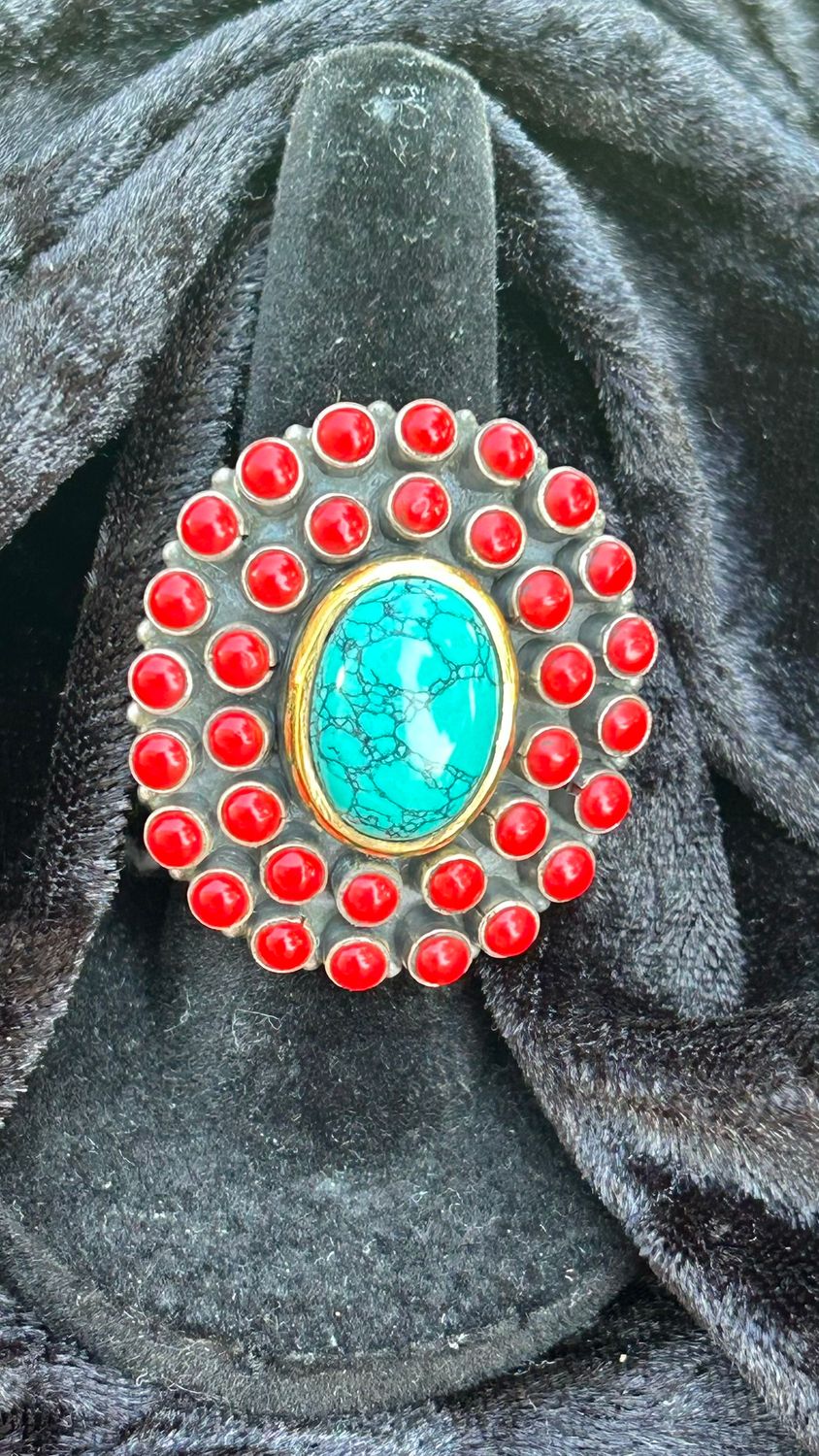 Sterling Ring with Turquoise and Coral cabochons.