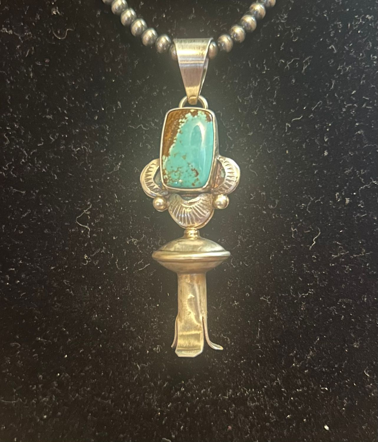 Native, Juanita McDonald Long. Kingman, Sterling Blossom pendant