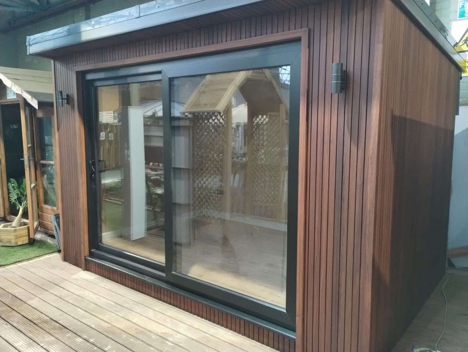 Premium 5.0m x 3.0m Ayous garden room with sliding door.