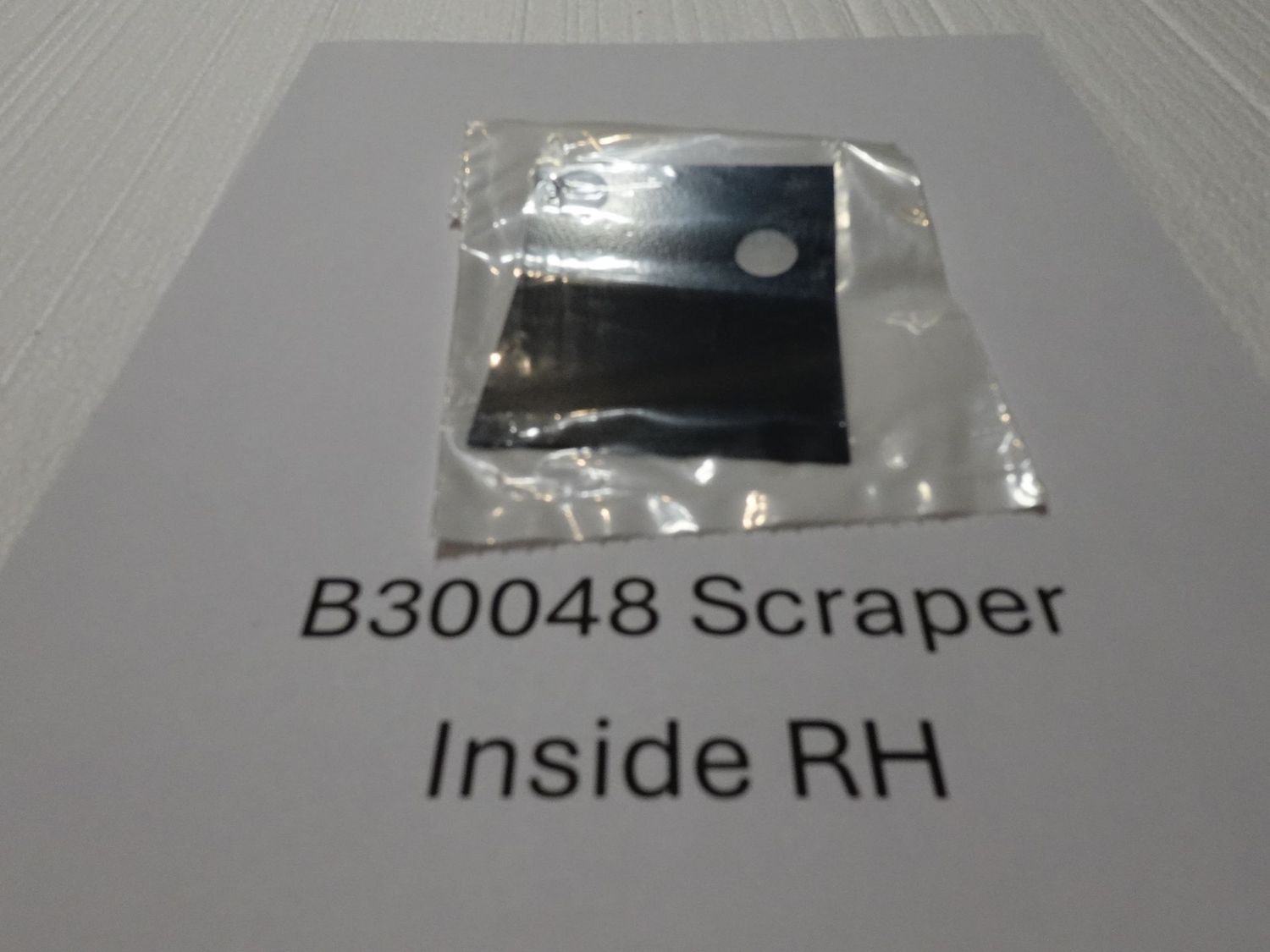 Scraper for inside disc opener RH Scraper for inside disc opener RH