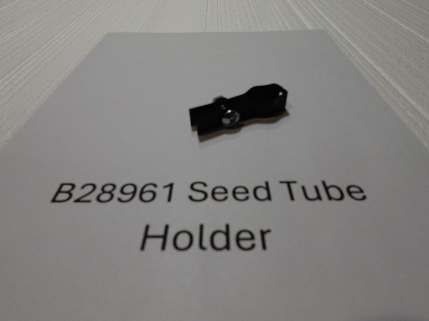 Tube Holder part #B28961 with bolt for John Deere 71 Planter Tube Holder part #B28961 with bolt for John Deere 71 Planter