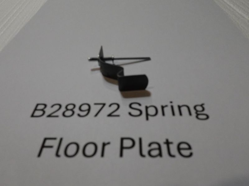 John Deere Planter Part # B28972 Spring for Hopper floor plate, with pop rivet.