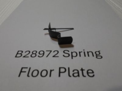 John Deere Planter Part # B28972 Spring for Hopper floor plate, with pop rivet. John Deere Planter Part # B28972 Spring for Hopper floor plate, with pop rivet.