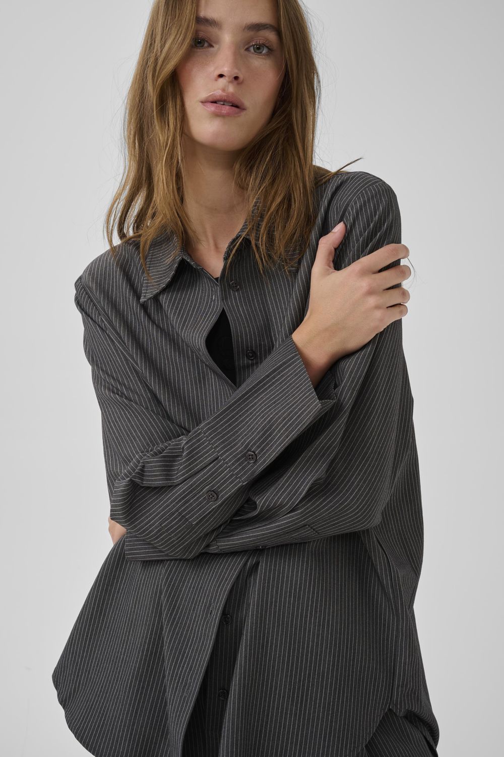 22 THE PINSTRIPED SHIRT