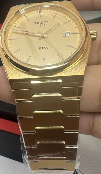 Tissot PRX Quartz Gold Dial 40mm Stainless Steel Watch – T137.410.33.021.00