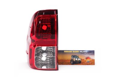 LENS &amp; BODY REAR L/H WELL BACK UTE 2