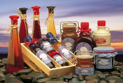 Assorted Newfoundland jams, jellies and preserves displayed in a wooden gift tray at Urban Market 1919.