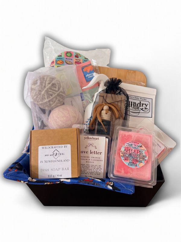 Newfoundland housewarming gift basket with local home fragrances, kitchen accessories and cozy home essentials.
