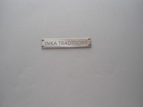 Placa de metal para coser